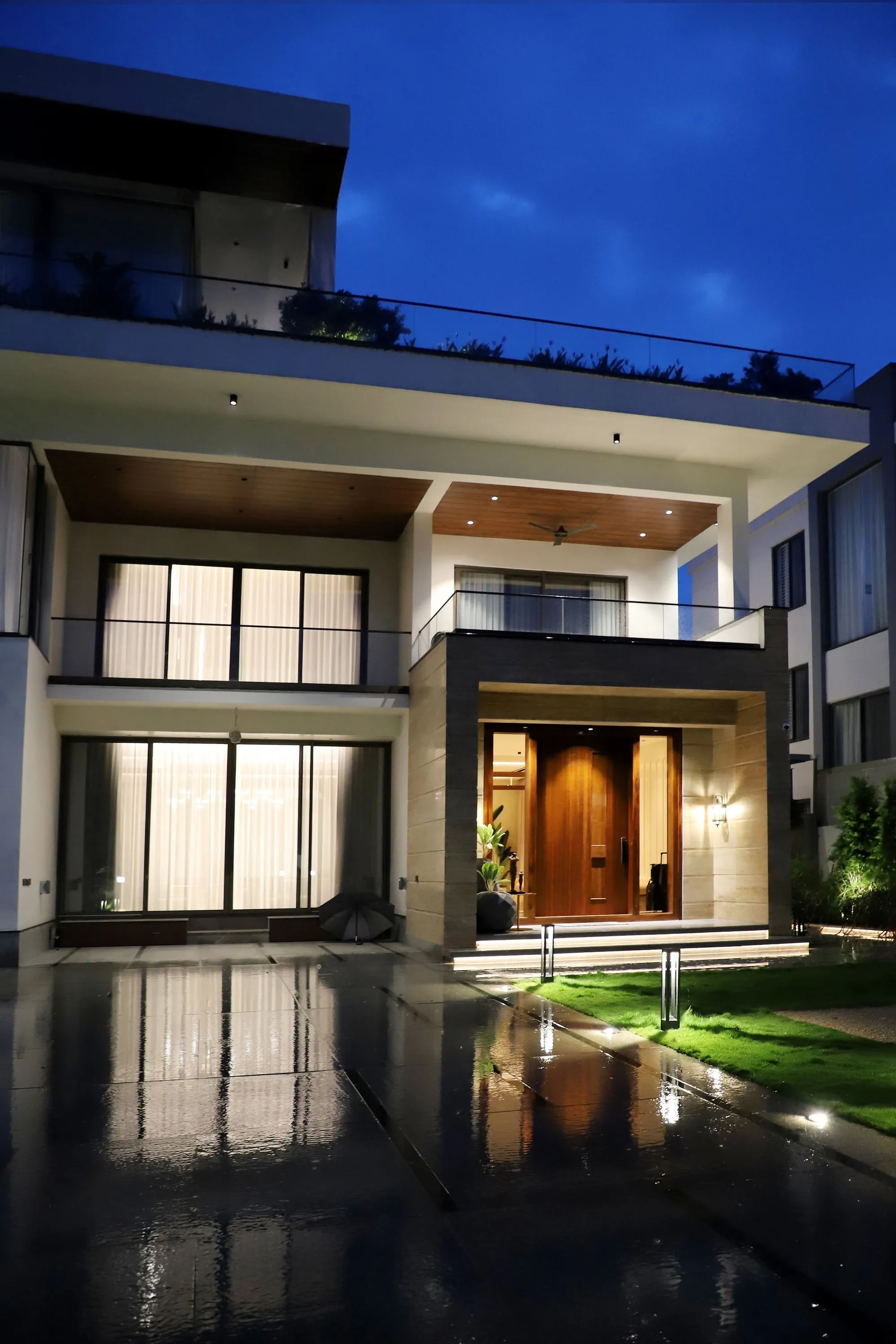 Modern independent home at dusk, representational