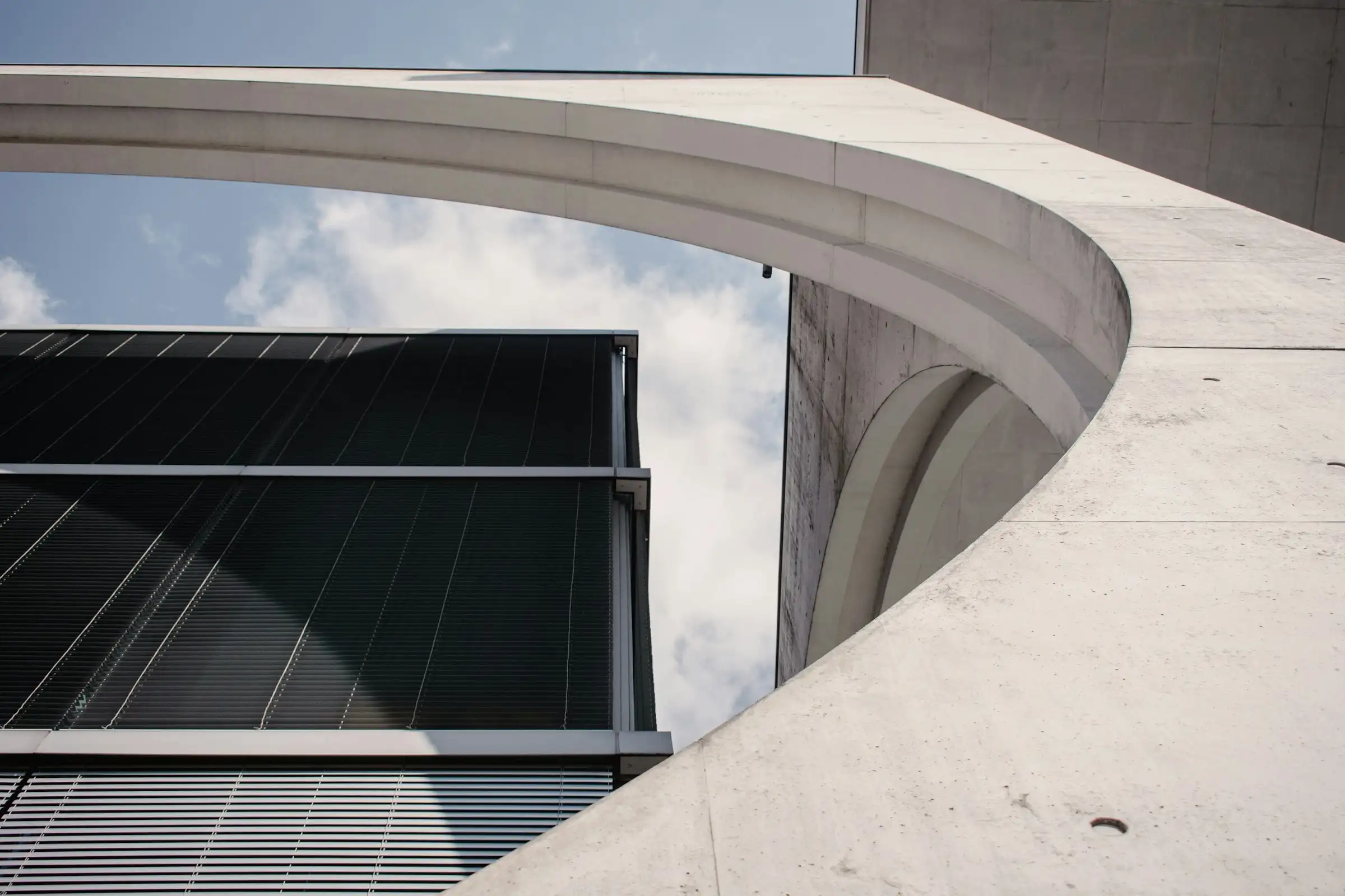 Modern commercial building facade at dusk, representational image for the upcoming Vista Square, Kurali–Ropar Highway