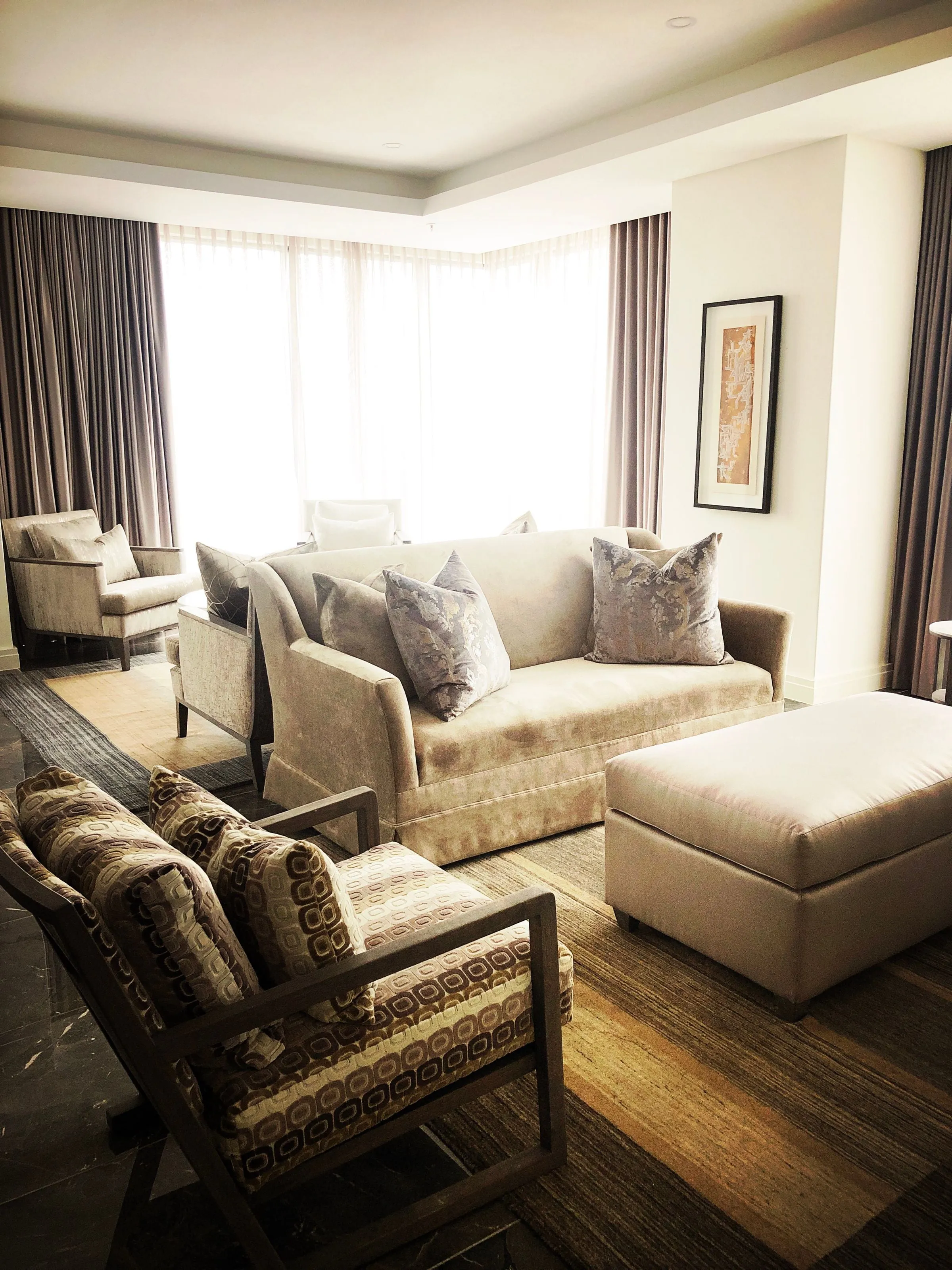 Warm, light-filled living room, representational image